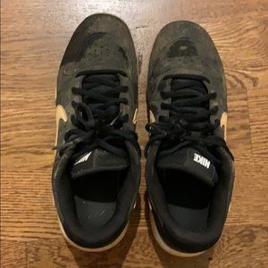 Black Nike baseball cleats
